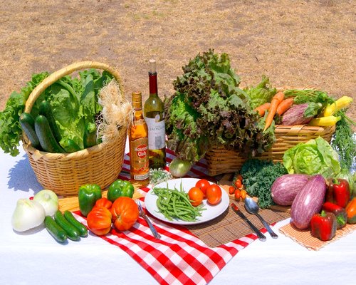 Various healthy foods including vegetables and grains on a table